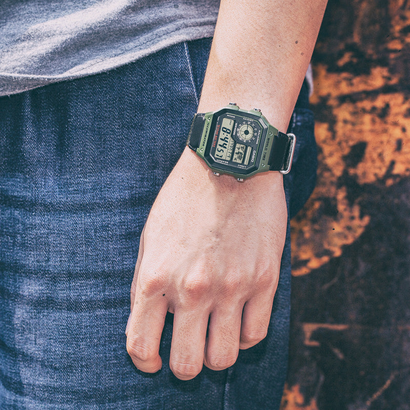 Casio Royale AE-1200WHB-3BV World Time Alarm Digital Green Canvas Strap Mens Watch