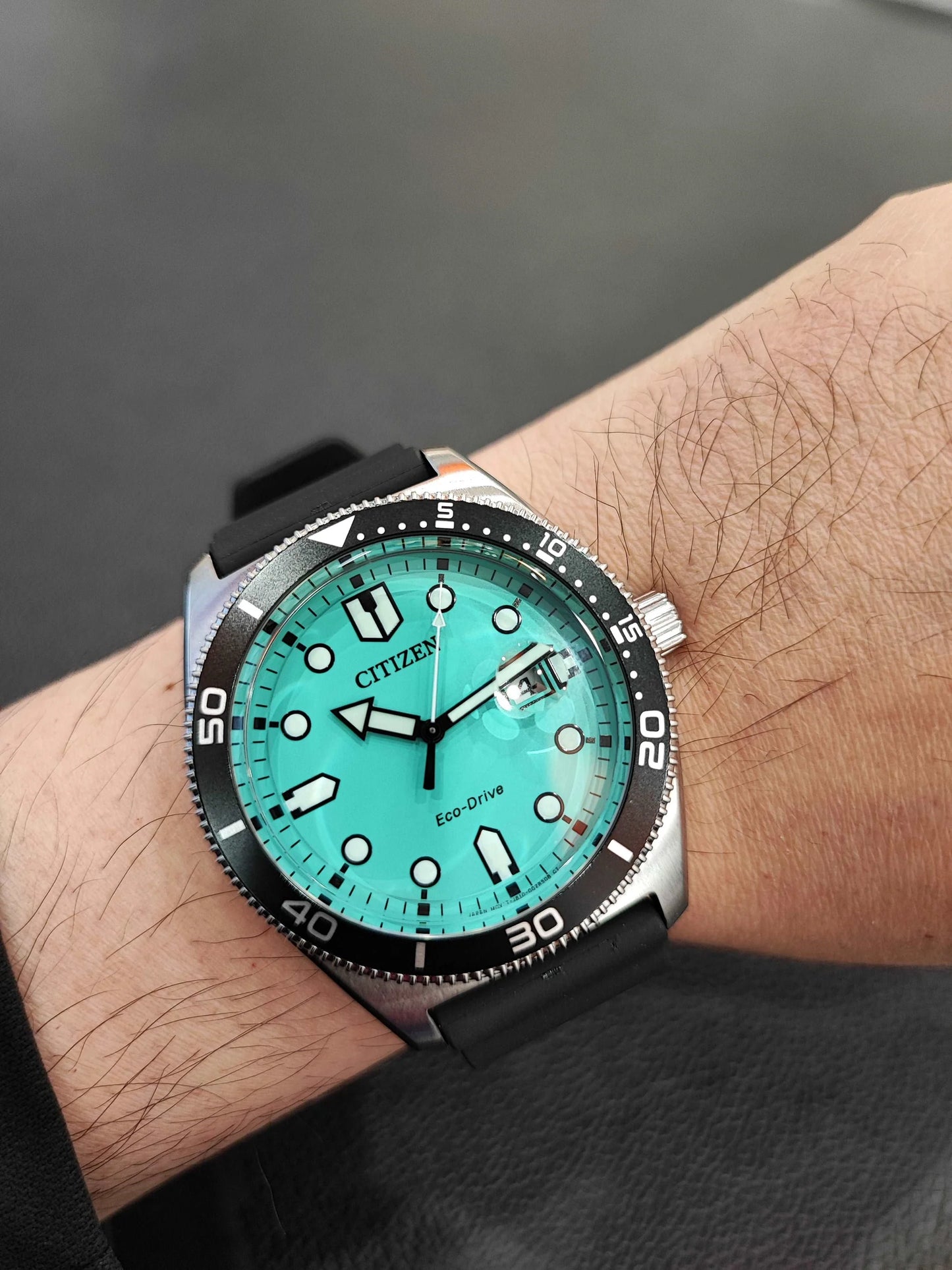 Citizen AW1760-14X  Eco Drive Rubber Strap Turquoise Dial Men’s Watch